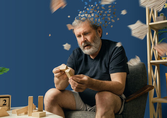 Drown image of losing of mind. Old bearded man with alzheimer desease has problems with his hands...