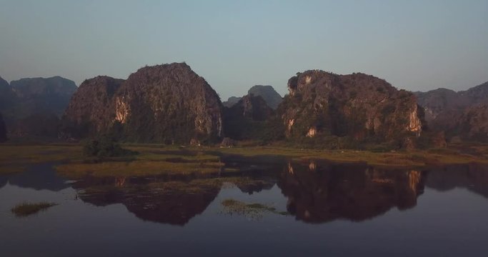 Reflective lakes and Mountains of Nihn Bihn