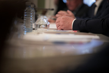 Press conference. Public speaker giving talk to Television camera. News conference. An event with a video camera. press and media in public news coverage event for reporter and mass communication