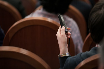 Closeup Black Digital Recorder Holding by Audience Hand in Meeting for Recording Lecture Voice