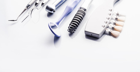 Dental surgery equipment on white table