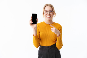 Attractive young girl wearing sweater standing isolated