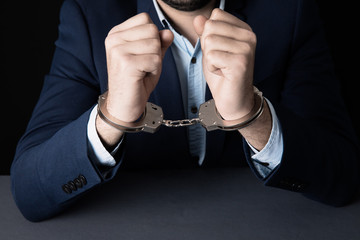man hand handcuffs