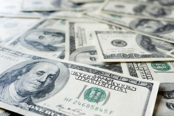 Pile of old one hundred dollar bills bills, close up dollars