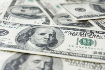 Pile of old one hundred dollar bills bills, close up dollars