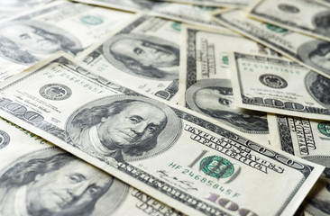 Pile of old one hundred dollar bills bills, close up dollars