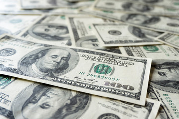 Pile of old one hundred dollar bills bills, close up dollars