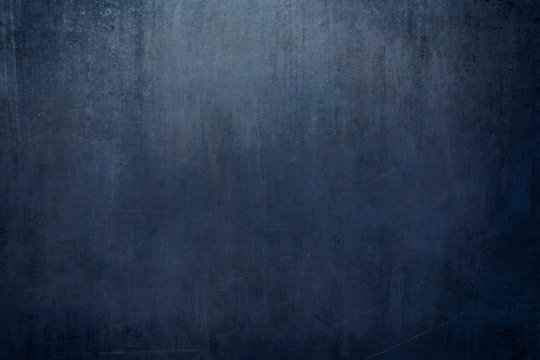 Old blue wall grungy background or texture