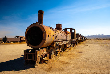 Fototapeta na wymiar Old rusty steam locomotives near Uyuni in Bolivia. Cemetery trains.