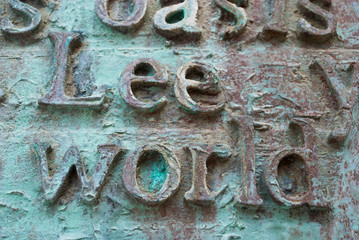 Metal letters and words in spanish and english. Text background.