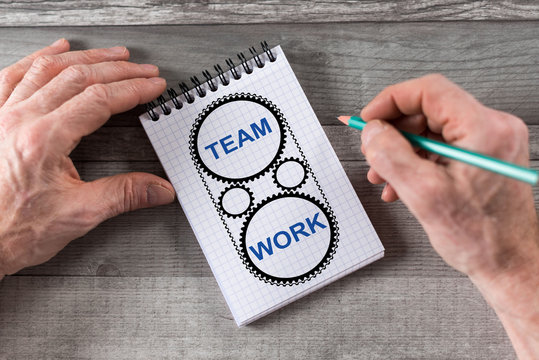 Teamwork concept on a notepad