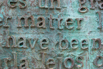 Metal letters and words in spanish and english. Text background vintage.