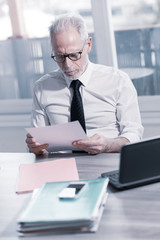 Businessman checking a document
