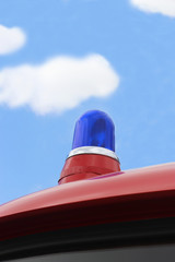 blue light on an old fire engine