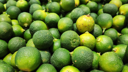 Calamansi green limes in market
