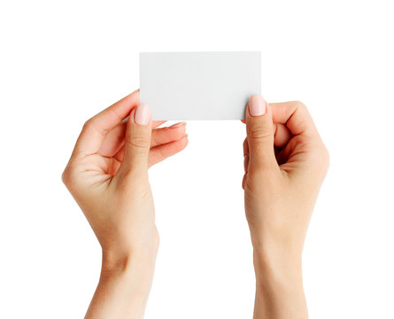 Woman Holding White Business Card In Hands Isolated On A White Background. Tamplate For Your Design.