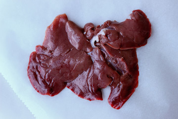 Raw rabbit liver. Concept is a healthy diet.