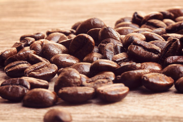 coffee beans on wooden background
