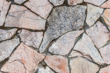 Obraz premium abstract background of pink and gray stone wall close up