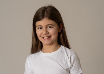 Obraz premium Portrait of a beautiful clever child with a happy, cheerful face looking confident. Human emotions