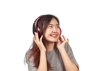 young woman wearing headset enjoying new audio tracks playing in smartphone.