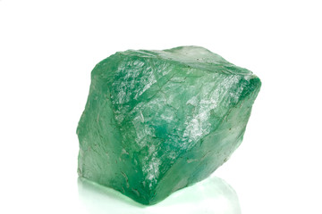 Macro stone green fluorite mineral on white background
