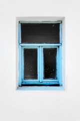 Fototapeta na wymiar Old vintage blue window on white wall
