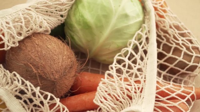Recycling mesh string bag full of vegetables and fruits, eco frindly no plastic concept 4k