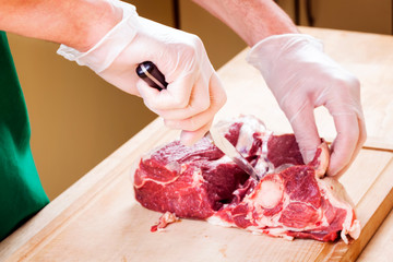 Separation of a raw mutton meat with rib