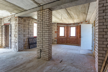 empty interior in house without repair with white silicate brick walls