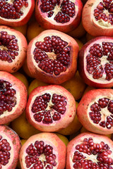 Pomegranates cut in half ready for juicing. Street market, Istanbul