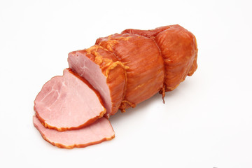 Pork tenderloin. Cold meat on a white background.