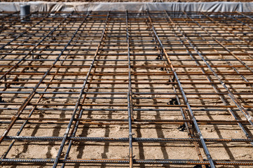Reinforced Foundation for pouring concrete in the construction of a house on a plot of land.