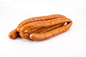 Chick dried thin sausage on a white background.
