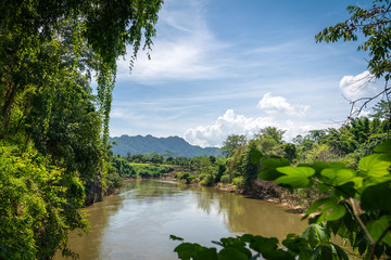 Blue sky high peak mountains fog hills mist scenery national park views at Phu Tub Berk, Khao Koh, Phetchabun Province, Thailand