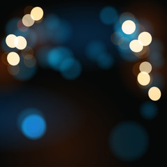 Dark blue abstract background with bokeh