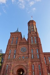 Fototapeta na wymiar WASHINGTON, DC -6 APRIL 2019- View of the Smithsonian Institution Building (the Smithsonian Castle) near the National Mall in the nation’s capital.