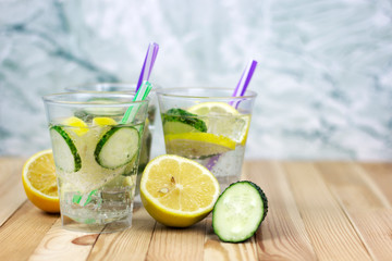 refreshing drink, soda with ice, mint, lemon and cucumber