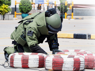 Bomb Disposal Expert in Bomb suit for Explosive ordnance disposal