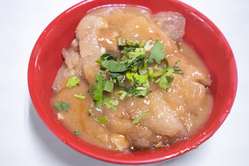 Bawan (Ba wan), taiwanese meatball delicacy, delicious street food, fried starch wrapped round shaped dumpling with pork inside, close up, copy space