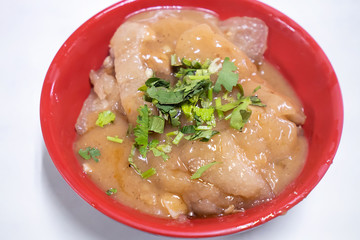 Bawan (Ba wan), taiwanese meatball delicacy, delicious street food, fried starch wrapped round shaped dumpling with pork inside, close up, copy space
