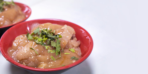 Bawan (Ba wan), taiwanese meatball delicacy, delicious street food, fried starch wrapped round shaped dumpling with pork inside, close up, copy space