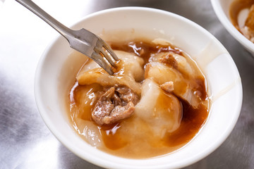 Bawan (Ba wan), taiwanese meatball delicacy, delicious street food, fried starch wrapped round shaped dumpling with pork inside, close up, copy space