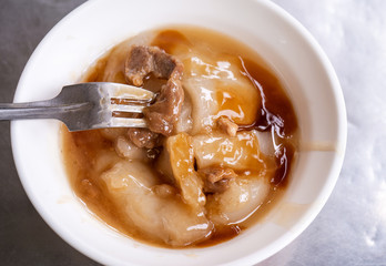 Bawan (Ba wan), taiwanese meatball delicacy, delicious street food, fried starch wrapped round shaped dumpling with pork inside, close up, copy space