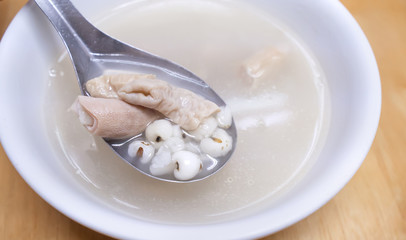 Four tonics soup, four ingredients herb flavor soup. Taiwanese delicious street food delicacy with Job's tears, pork intestines, close up, copy space