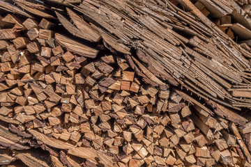 Firewood piled in stack outside