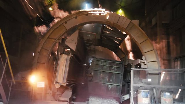 Unique coal unloading by flipping the train. Authentic shot