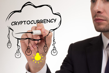 Business, technology, internet and networking concept. Young entrepreneur showing keyword: Cryptocurrency