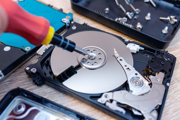 old broken hard disk drives composition in a repair recovery service