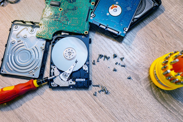 old broken hard disk drives composition in a repair recovery service